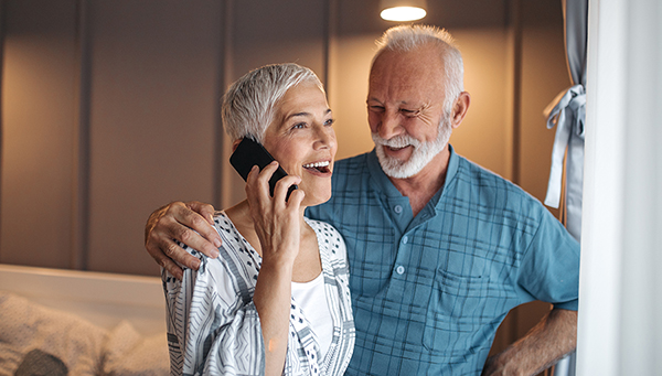 Happy senior woman talking on a mobile phone.